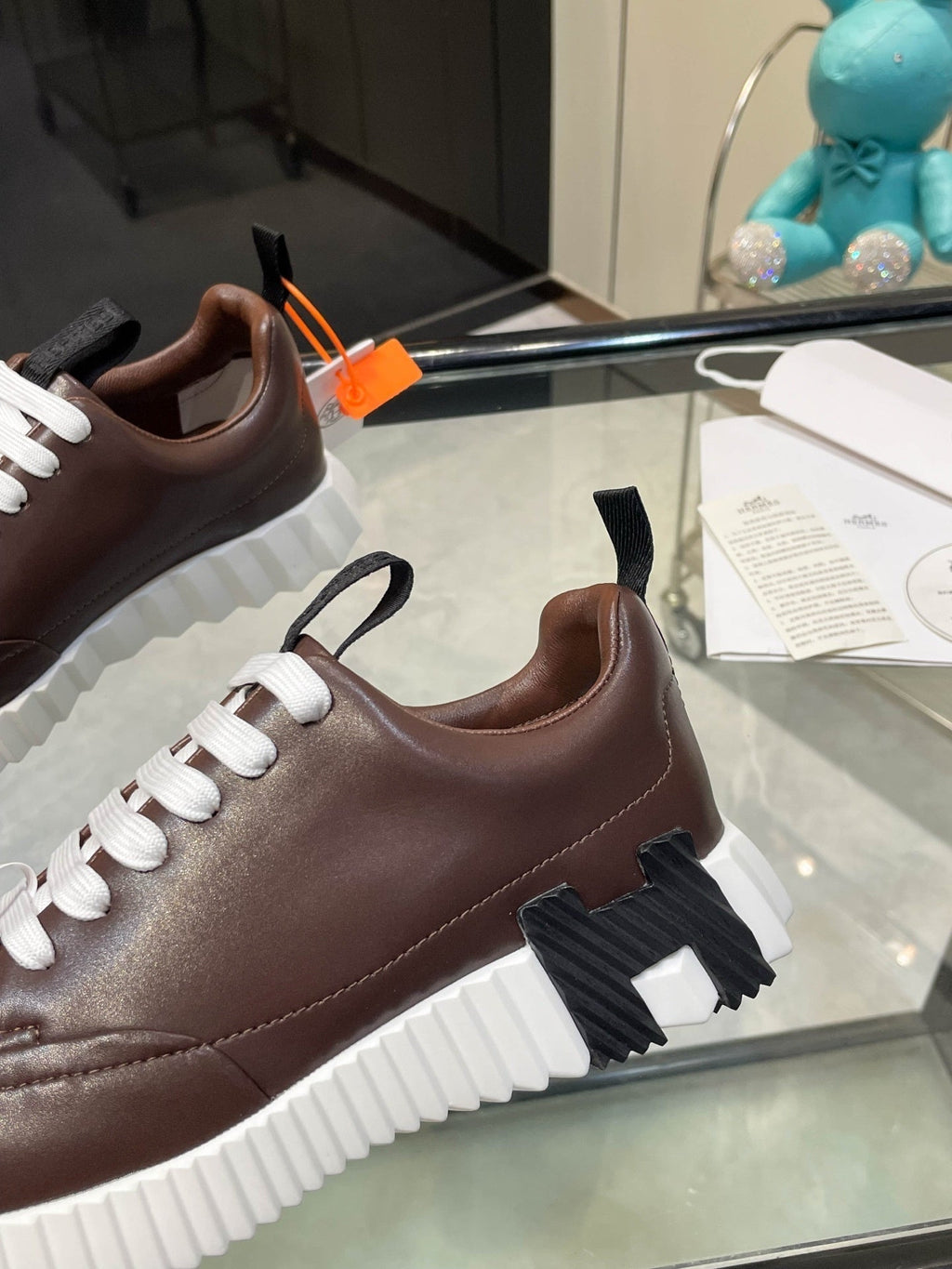 H Striped Leather Sneakers