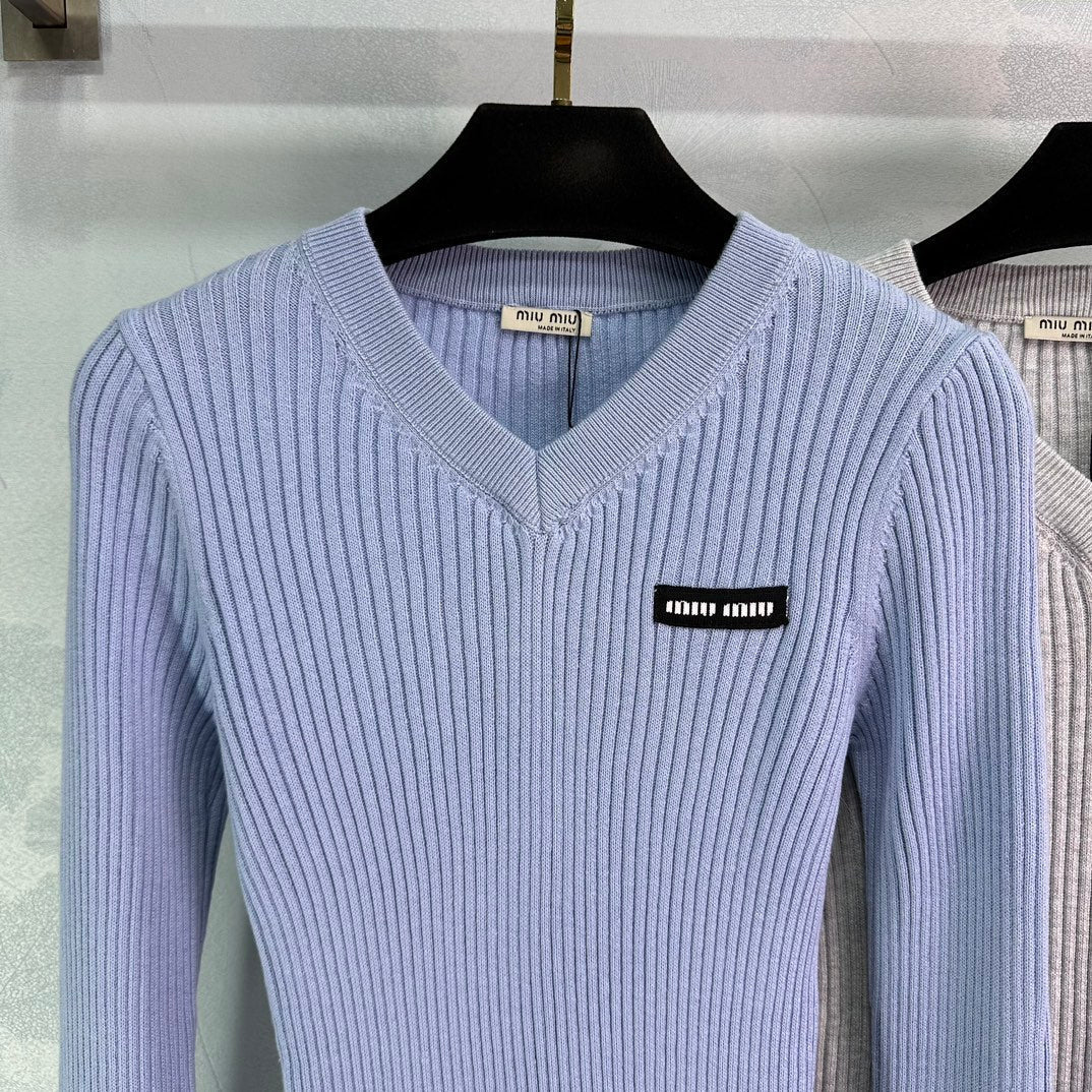 Ribbed High-Neck Wool Sweater
